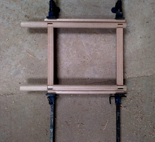 Clamping rails to round chair legs
